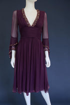 1990s whimsical witchy bell sleeve cocktail dress