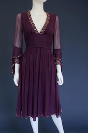1990s whimsical witchy bell sleeve cocktail dress